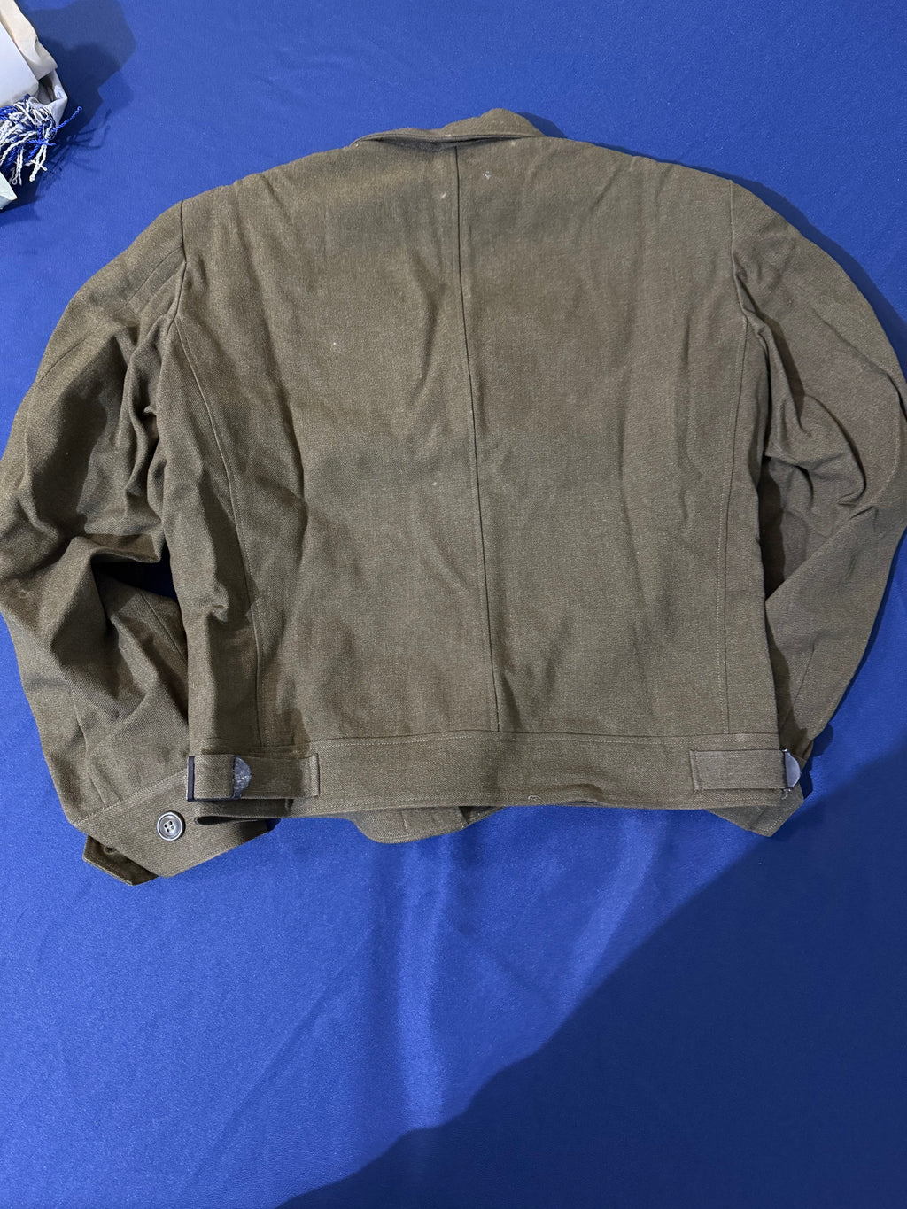 Original WWII U.S. Army uniform grouping attributed to John Reed, who served with the 16th Armored Field Artillery Battalion of the 9th Armored Division and later associated with the 102nd Infantry Division, known as the “Ozark” Division.