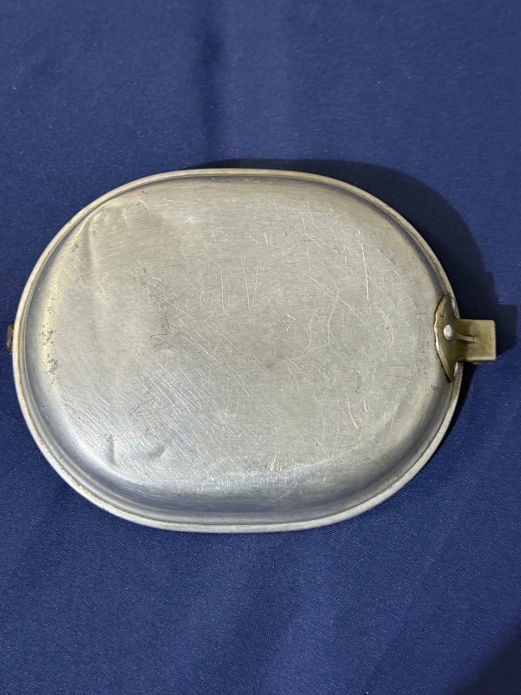 Original World War I-era U.S. mess kit, complete with its matching fork and knife. USMC and EGA on lid.
