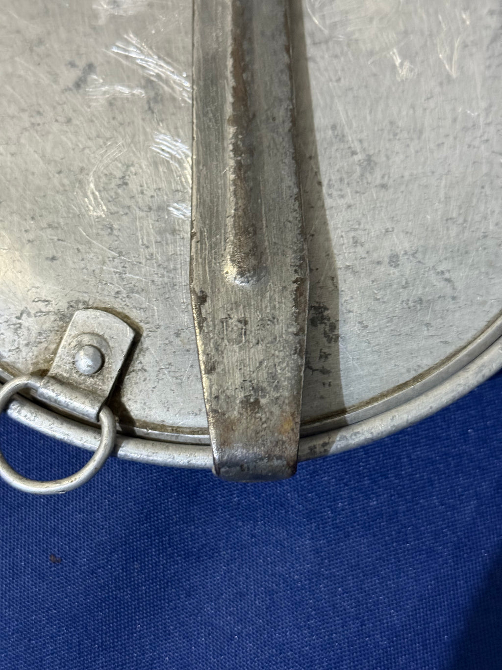 Original World War I-era U.S. mess kit, complete with its matching fork and knife. USMC and EGA on lid.
