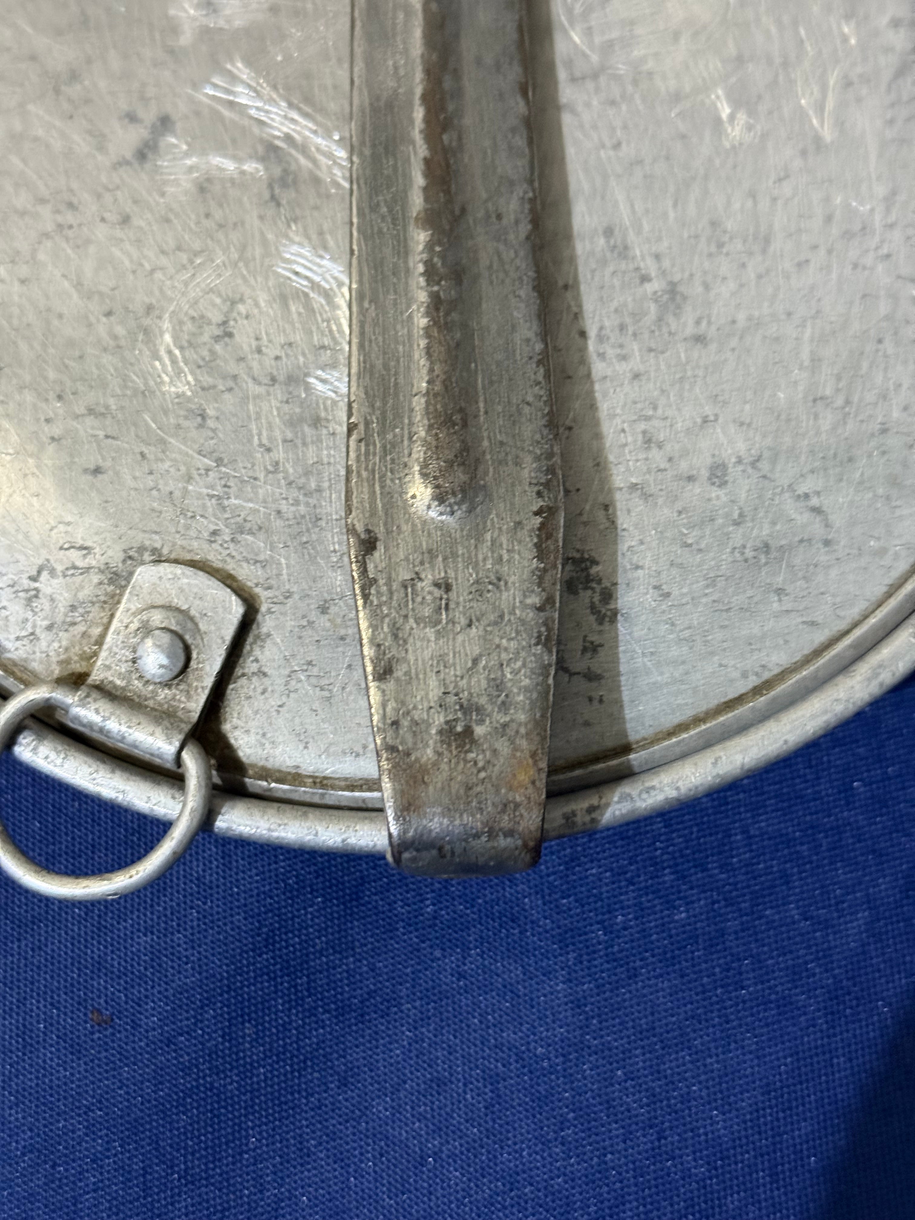 Original World War I-era U.S. mess kit, complete with its matching fork and knife. USMC and EGA on lid.
